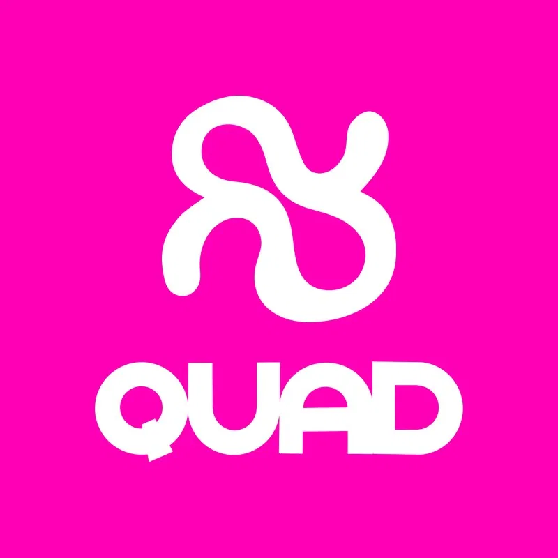 QUAD lockup in white on magenta